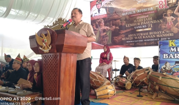 Kadis PMPTSP Nuryadin Bacakan Sambutan Bupati Way Kanan di Hari Jadi ke 71 Lembur Pasundan Jaya